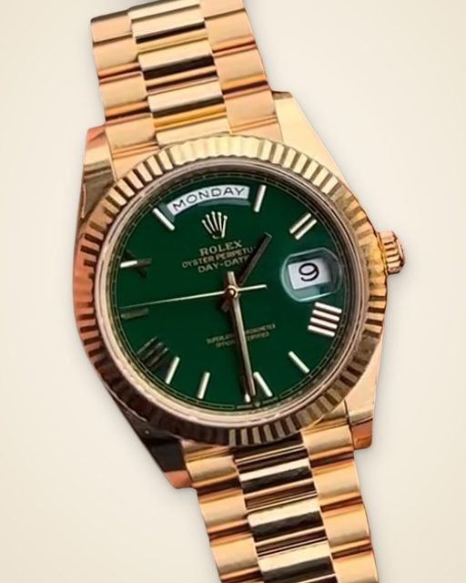 Rolex Day-Date · مينا خضراء بأرقام رومانية · I
